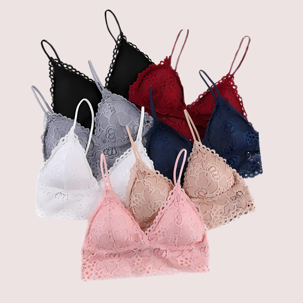 Collection of lace bras in various colors on a light background