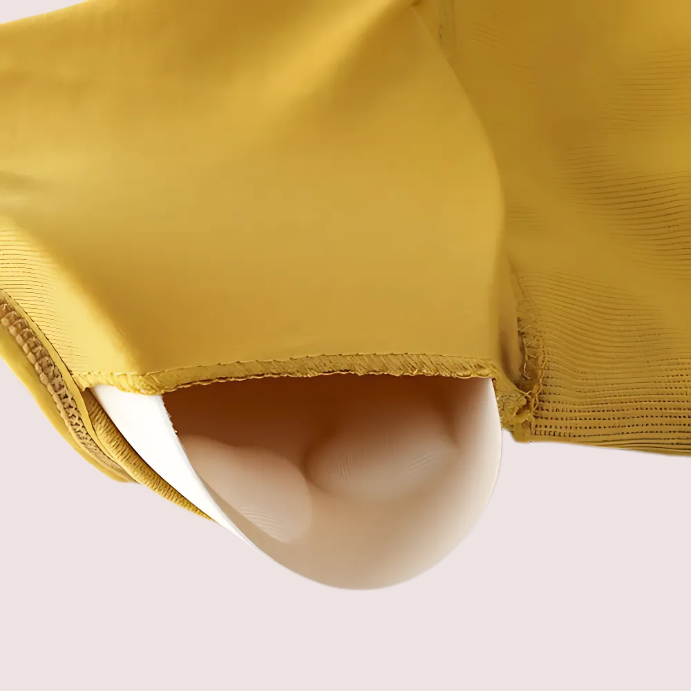 Close-up of a yellow garment with a white background
