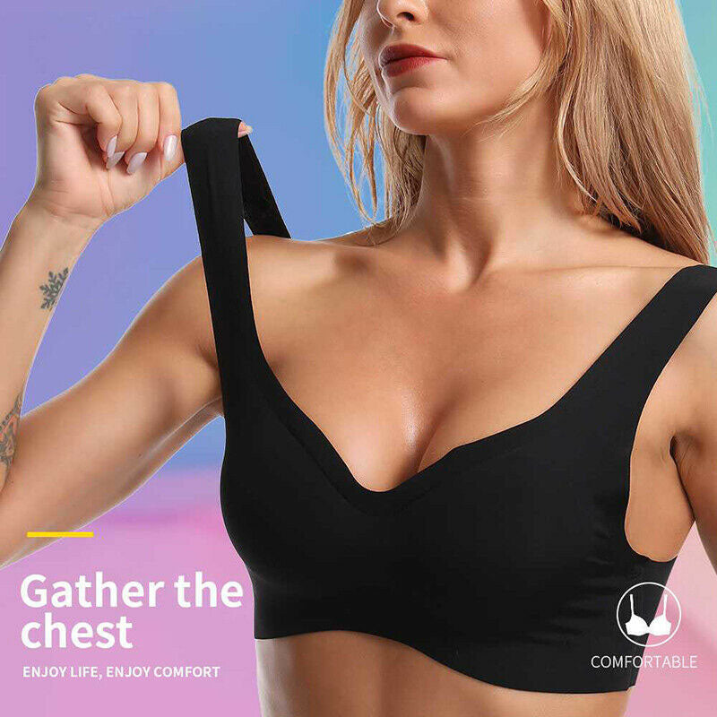 Woman wearing a black sports bra with a colorful gradient background