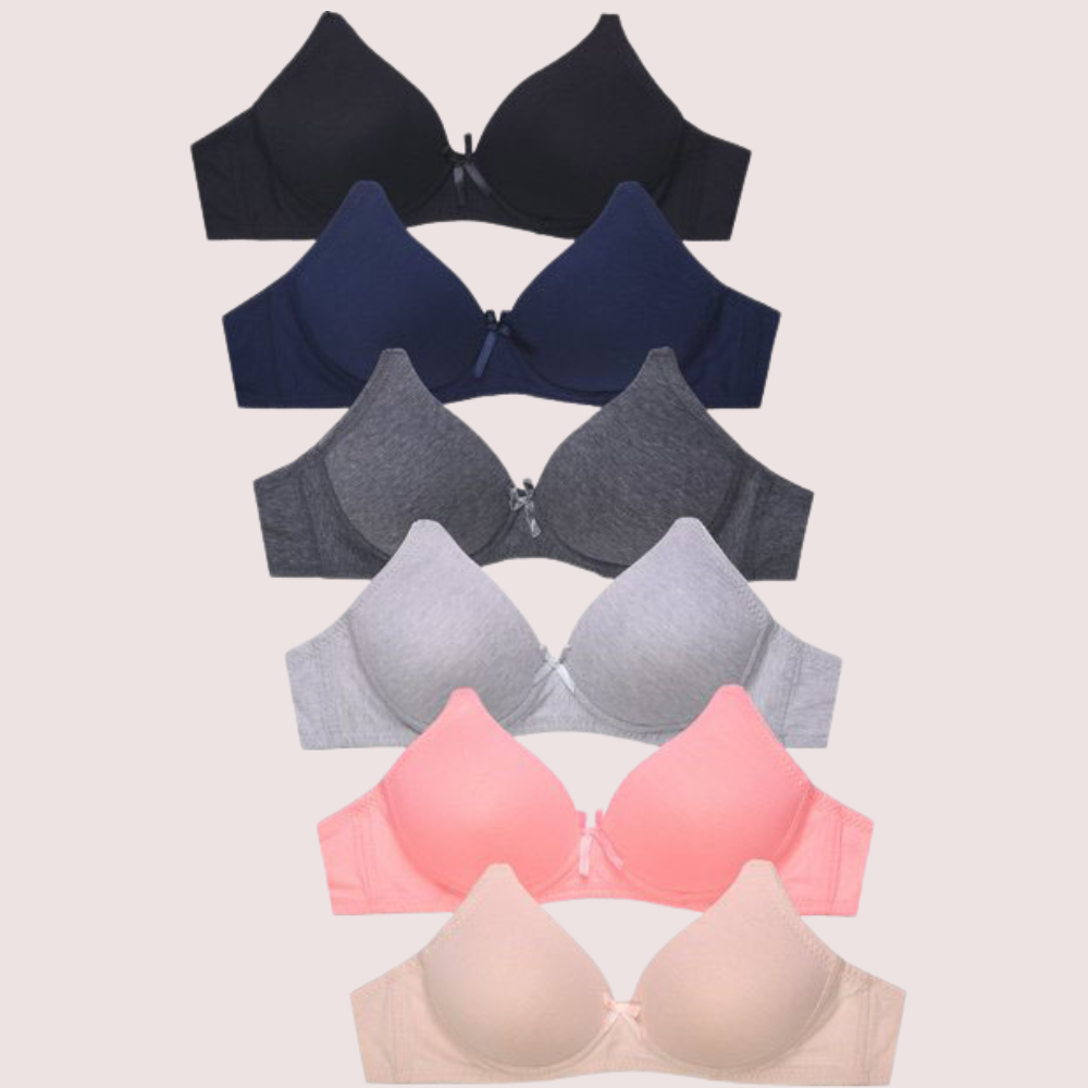 Set of four bras in black, navy, gray, and pink on a light beige background