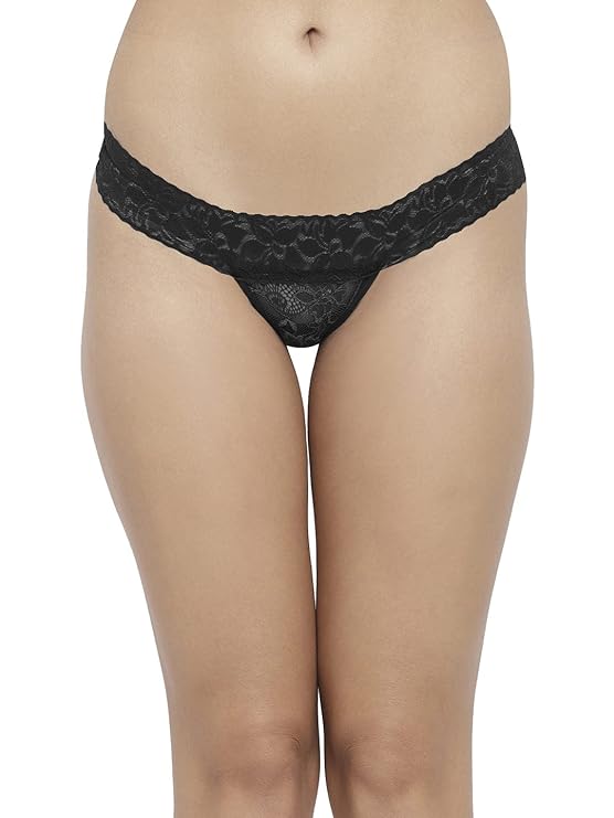 Black lace thong worn by a person on a white background