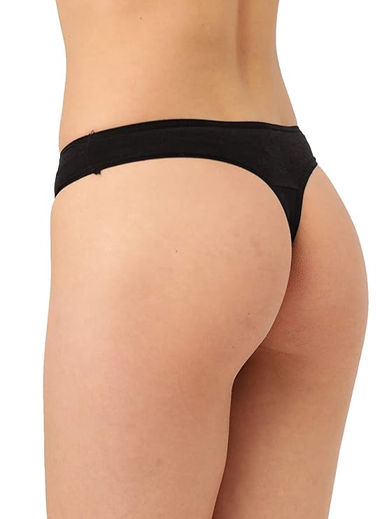 Black thong worn by a person on a white background