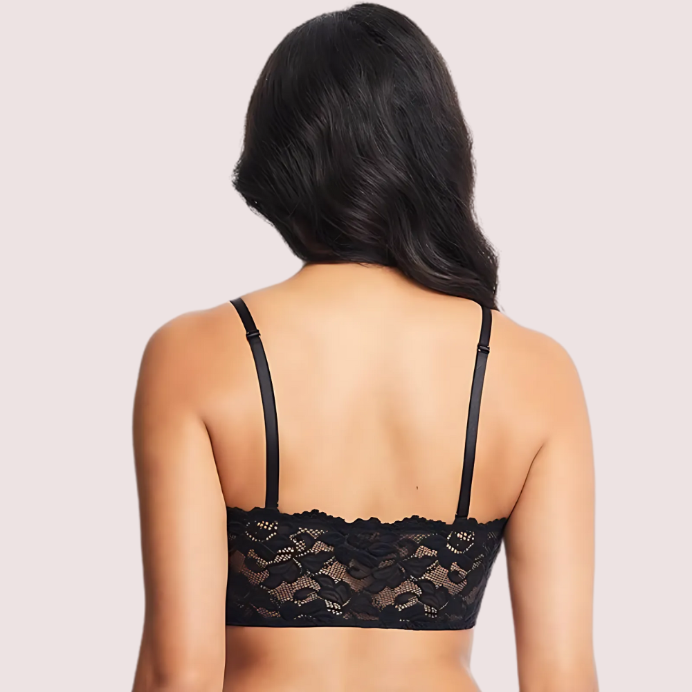 Black lace bra on a plain background