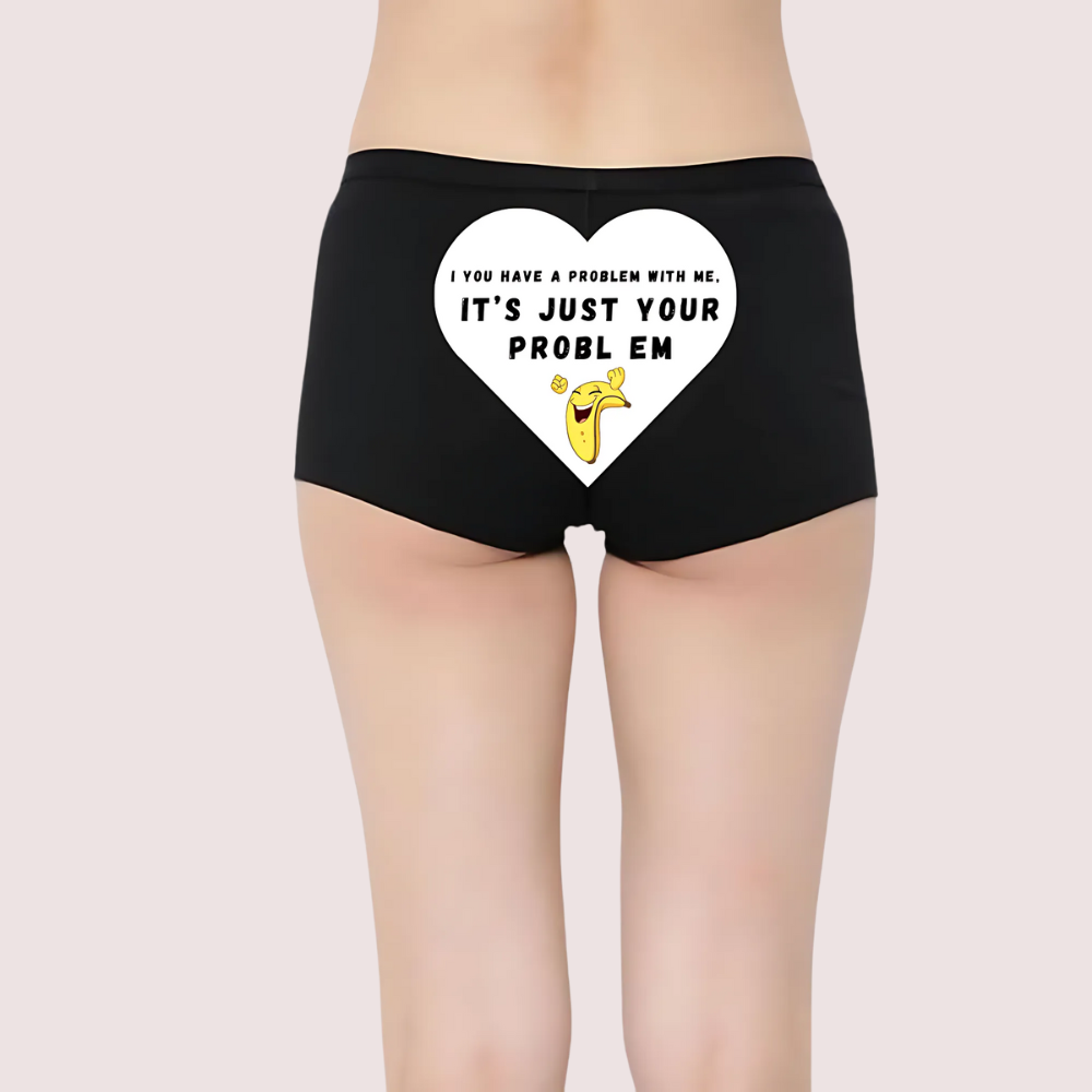 Black underwear with a white heart graphic and text on a plain background