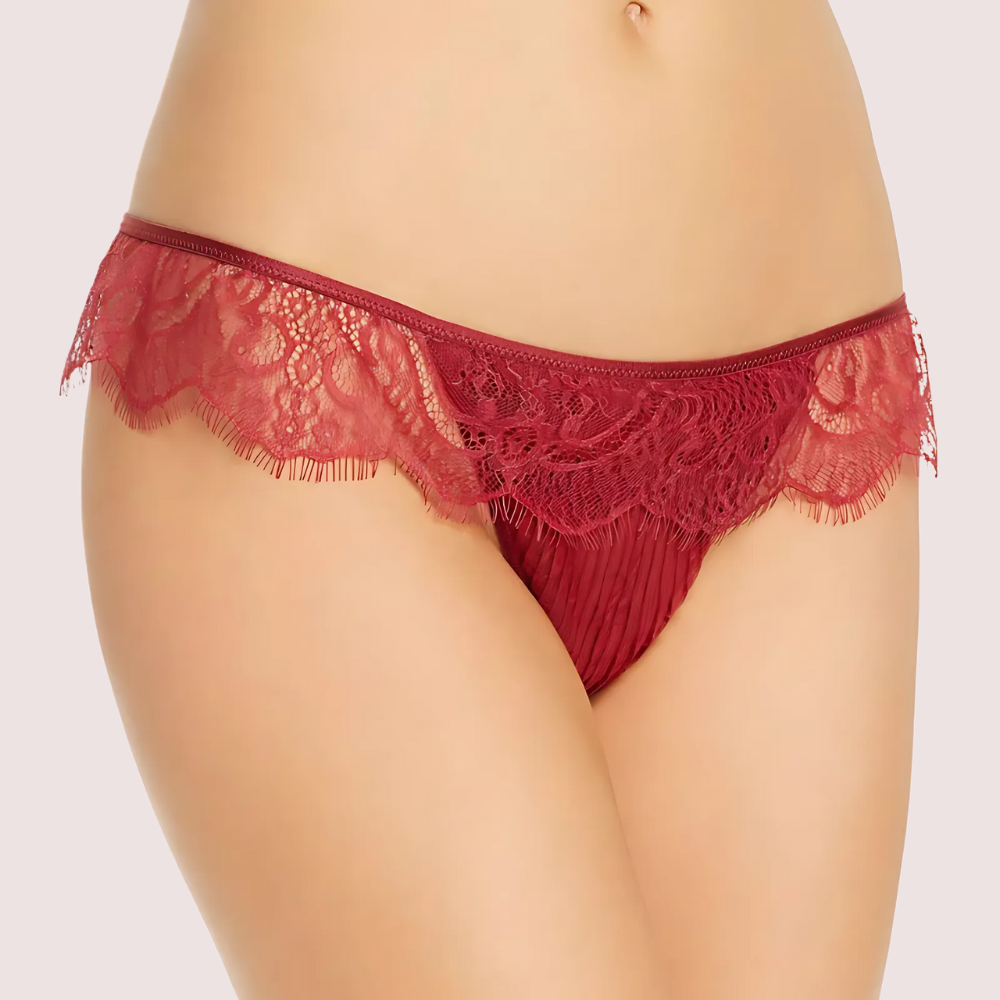 Red lace underwear on a plain background