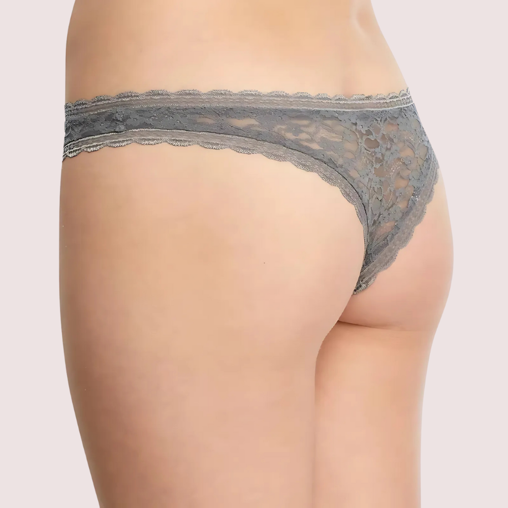 Gray lace underwear on a beige background