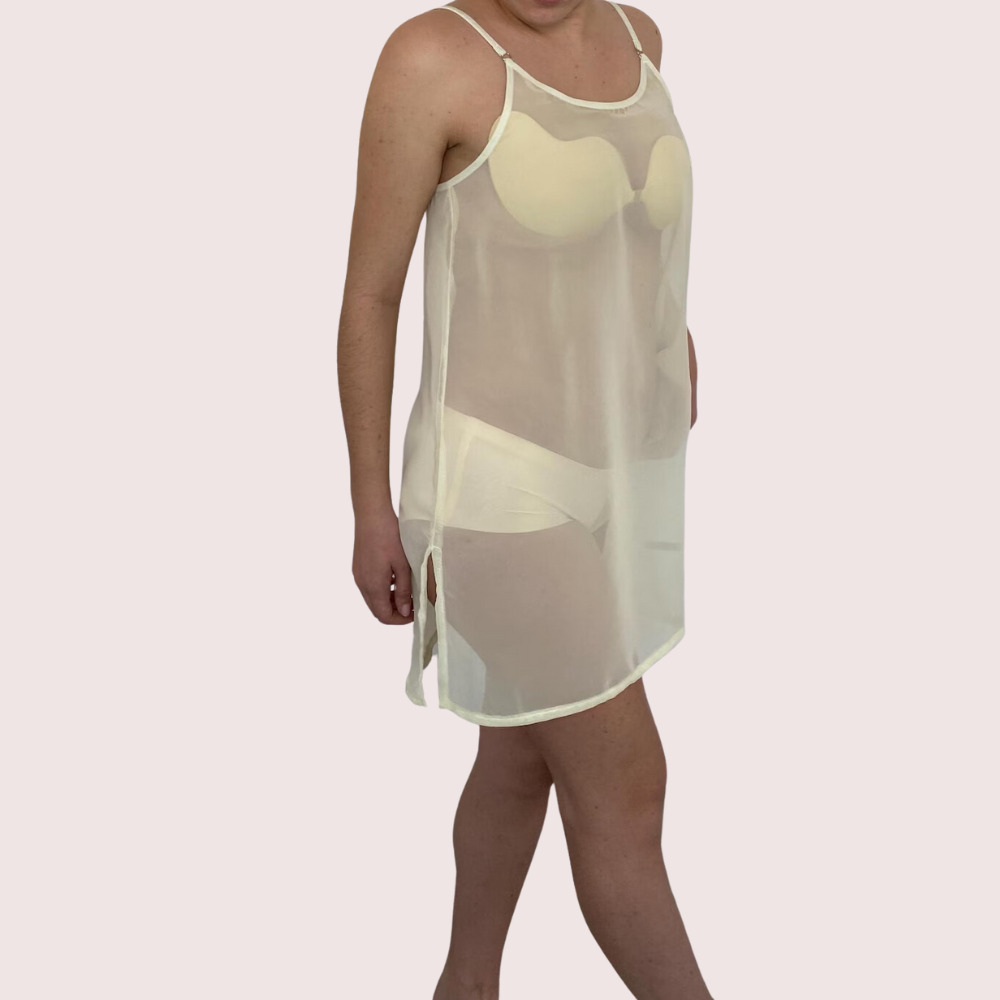 Sheer white tank top worn by a person on a light pink background
