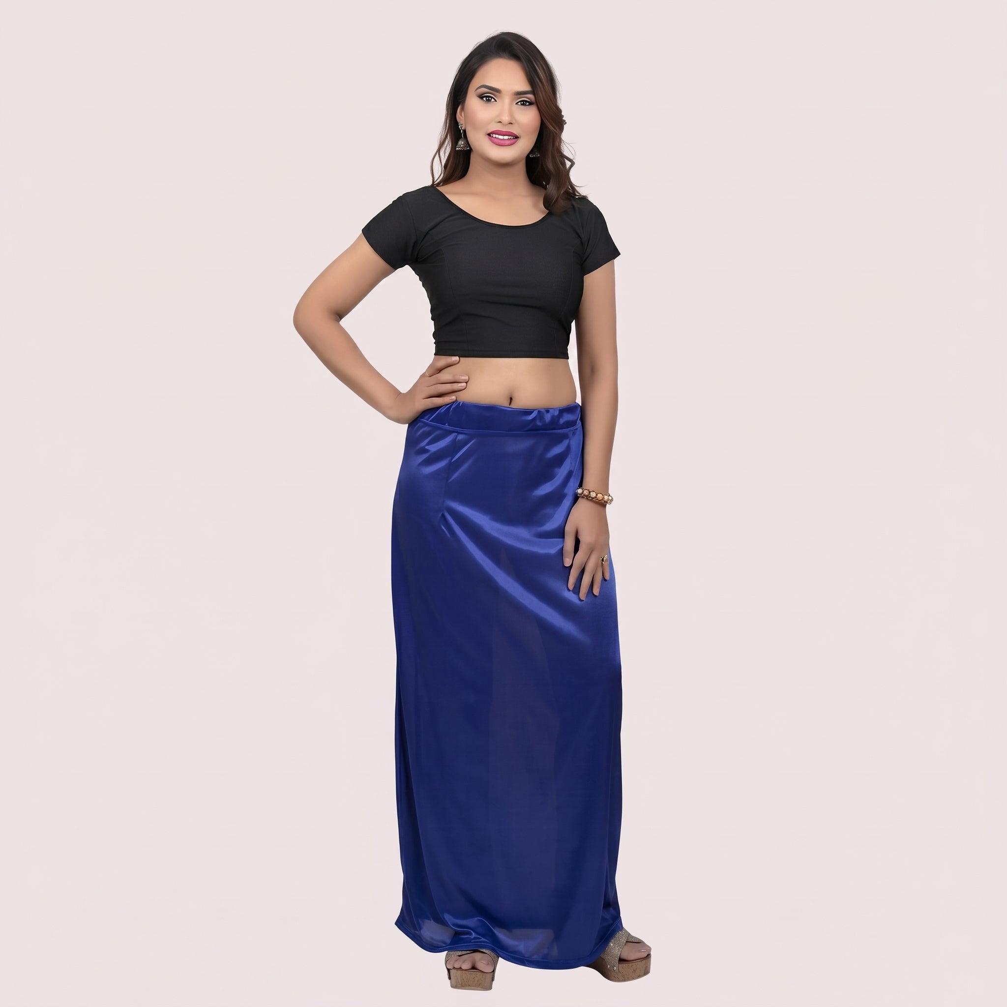Woman wearing a black top and blue petticoat 