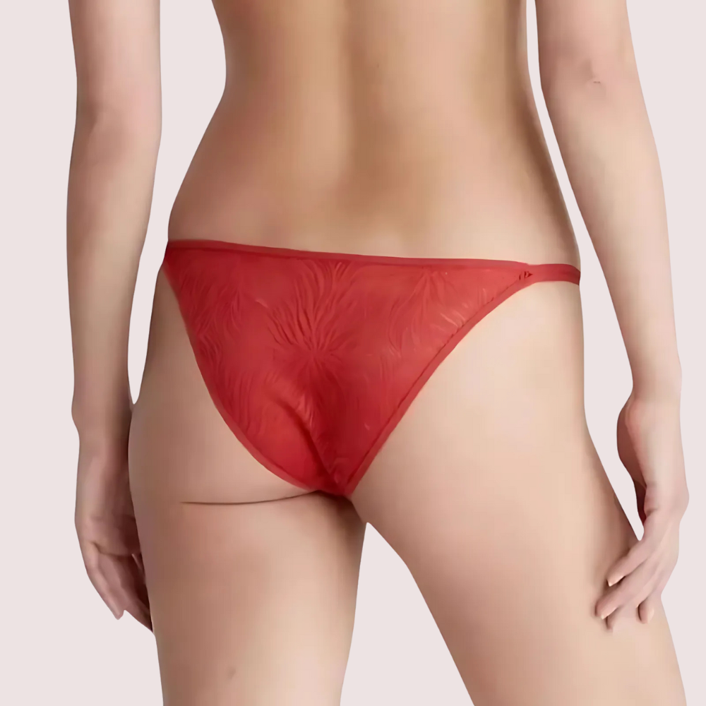 Red bikini bottom on a plain background