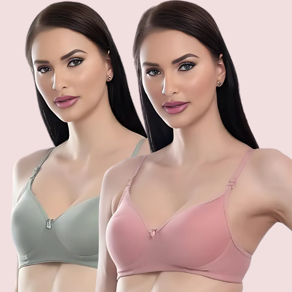 Two women wearing different colored bras on a pink background