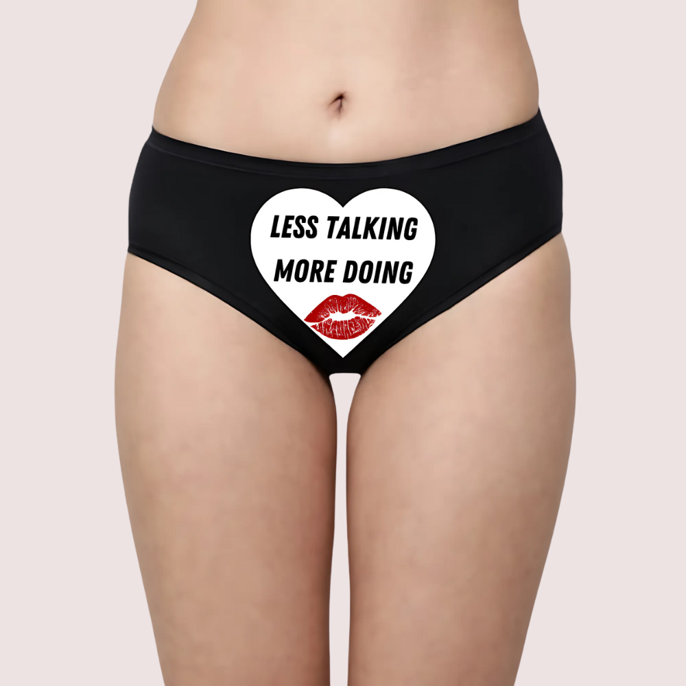 Black underwear with a heart design and text on a plain background