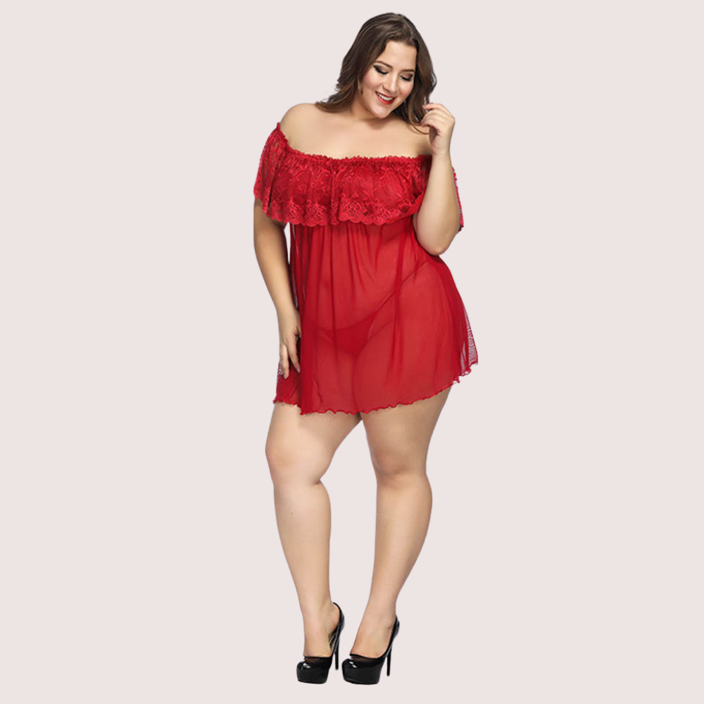 Woman wearing a red off-shoulder dress on a light pink background