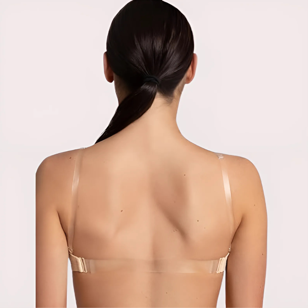 Woman wearing a beige sheer top 