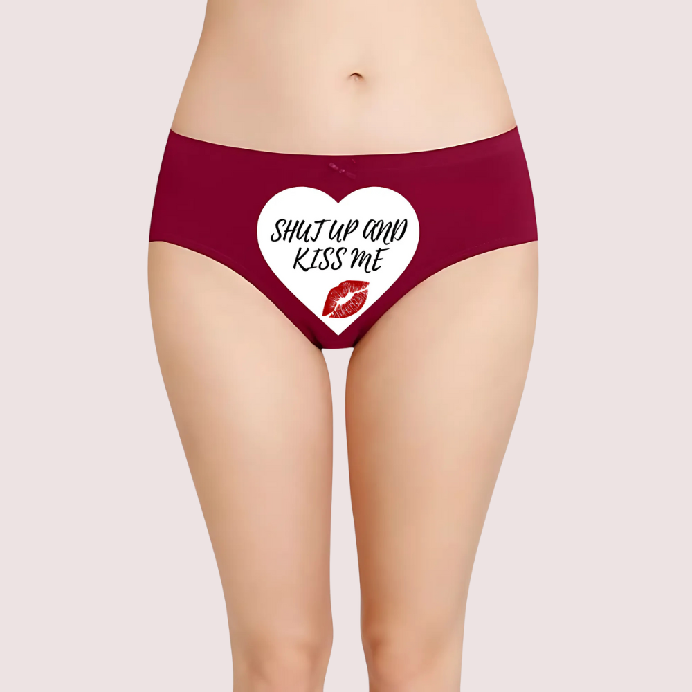 Maroon underwear with a heart design and text on a plain background
