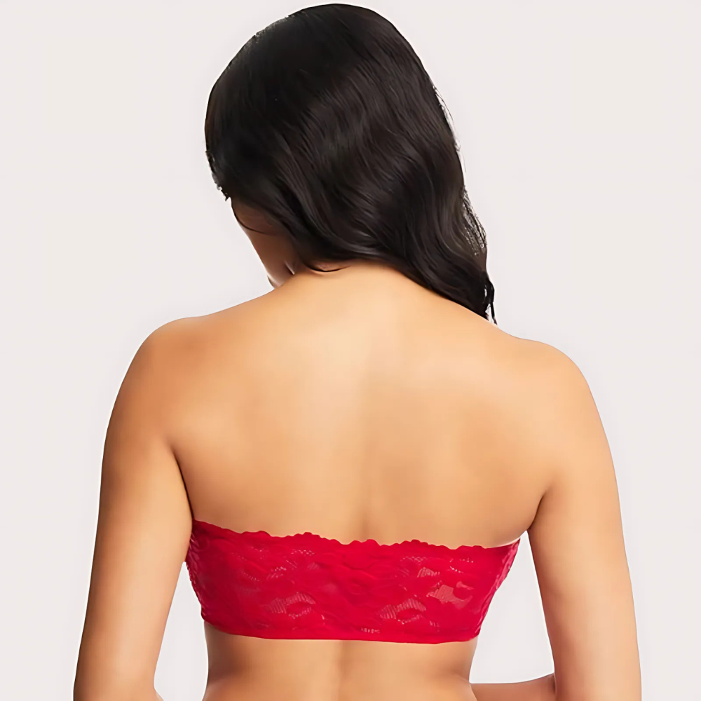 Red strapless lace top worn by a person on a plain background
