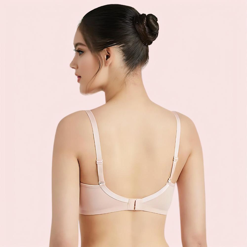 Woman wearing a beige bra back side