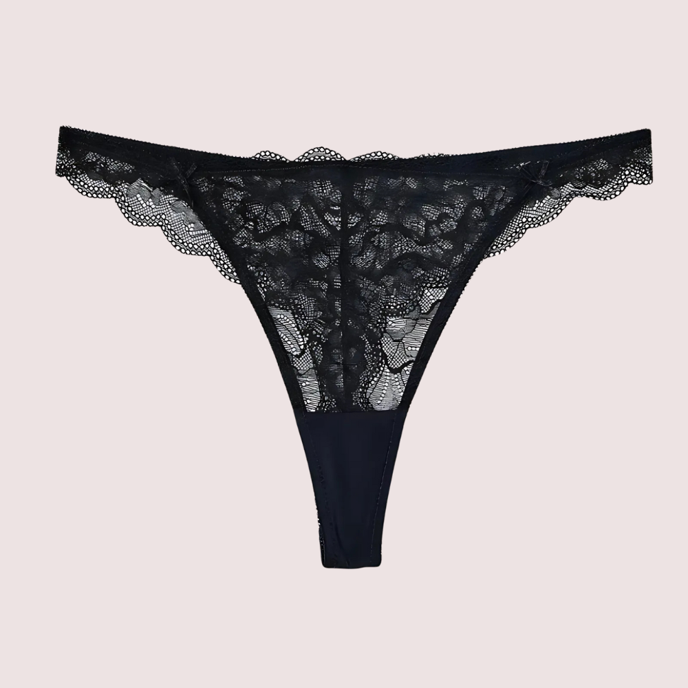 Black lace thong on a light gray background