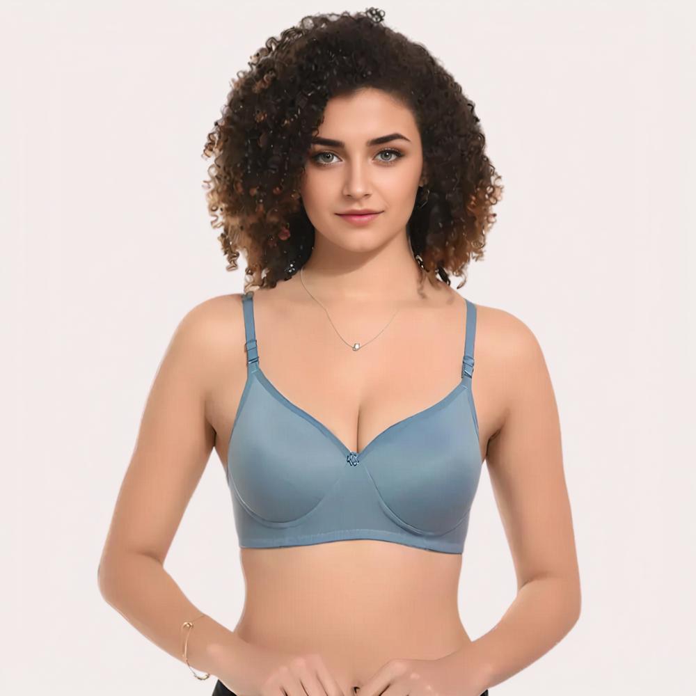 Woman wearing a light blue bra 