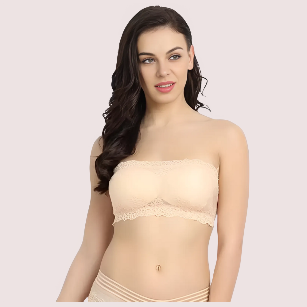 Woman wearing a beige strapless top with lace details 