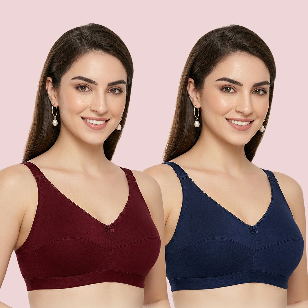 Two women wearing different colored bras 