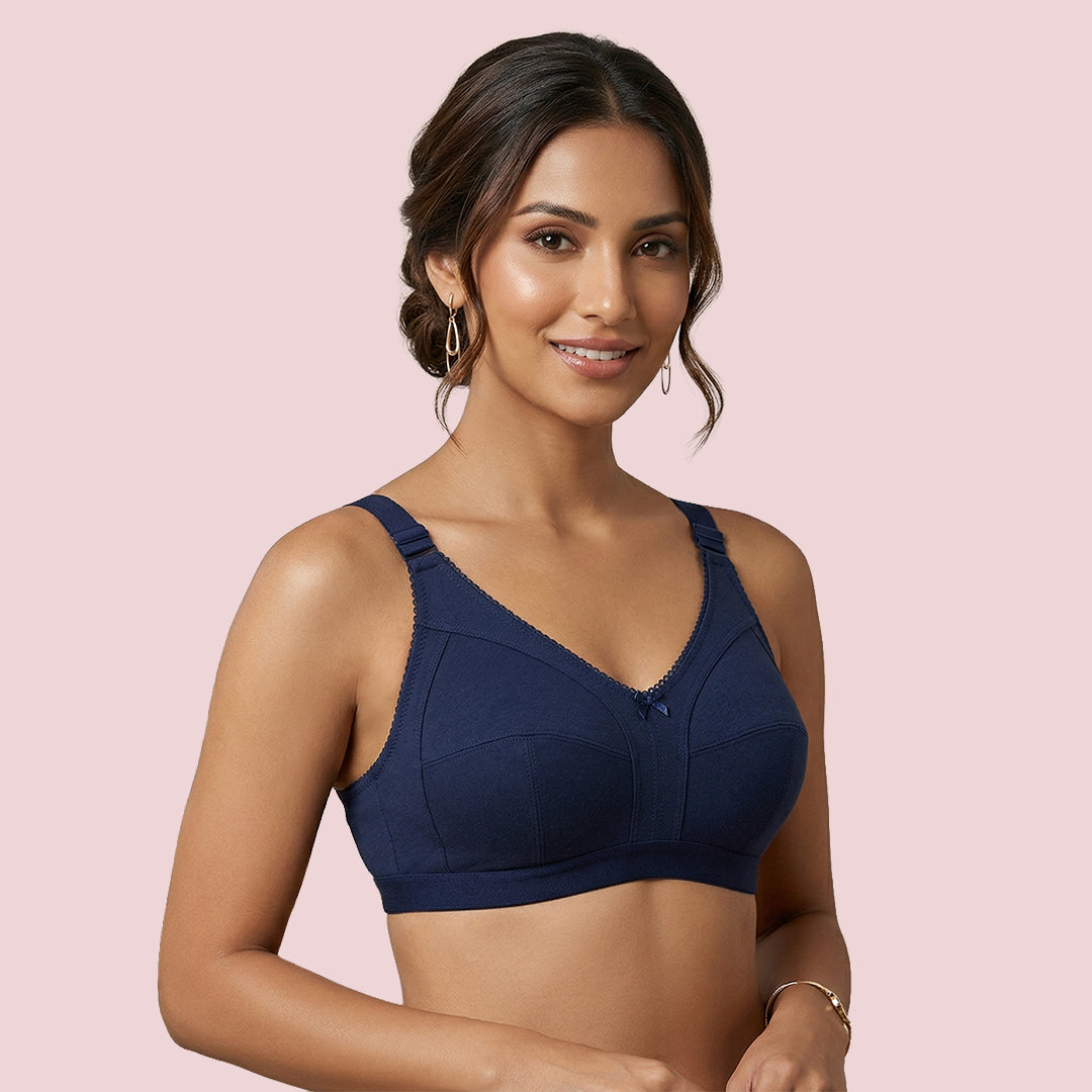 Woman wearing a navy blue bra 