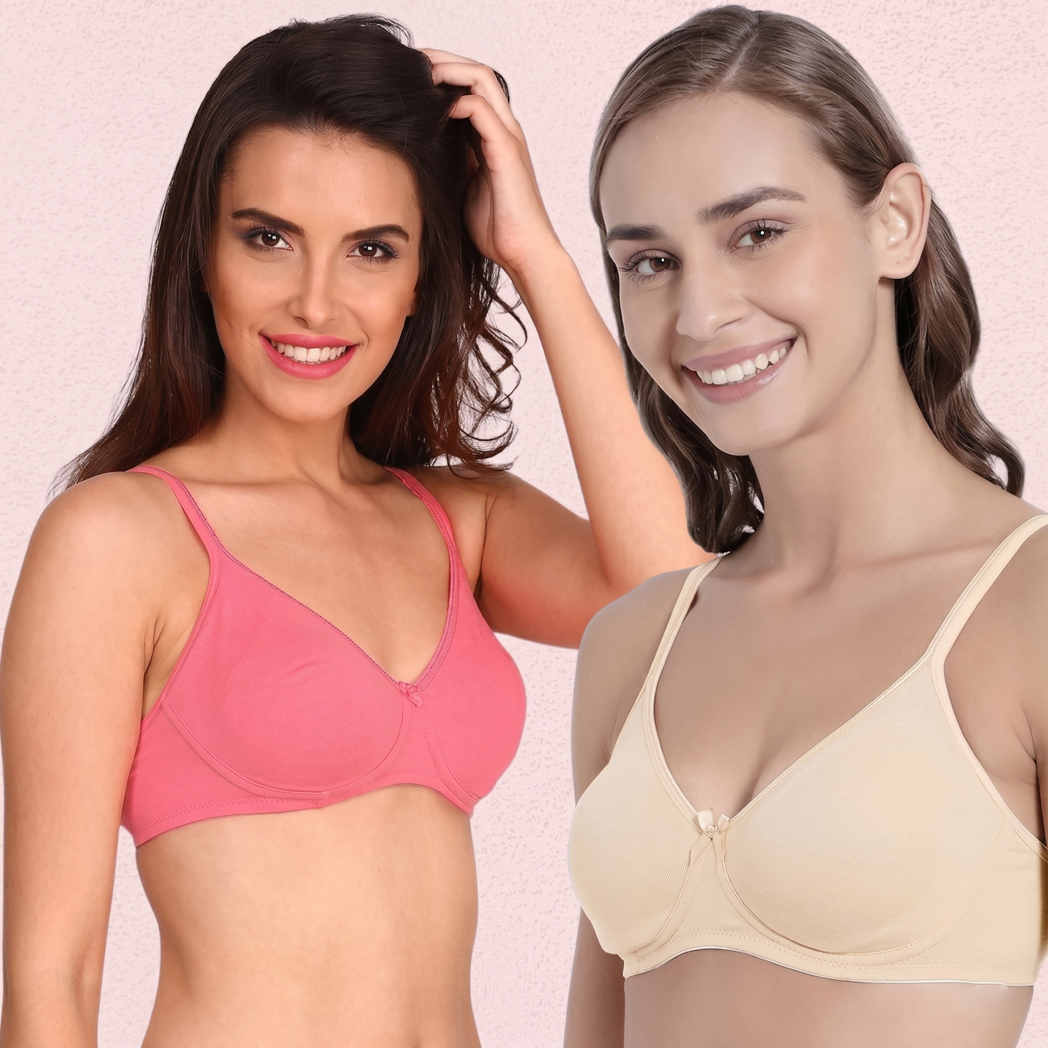 Two women wearing pink and beige bras against a plain background