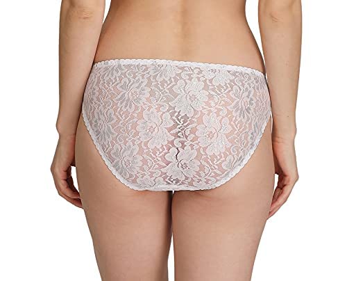 White lace underwear worn by a model on a white background