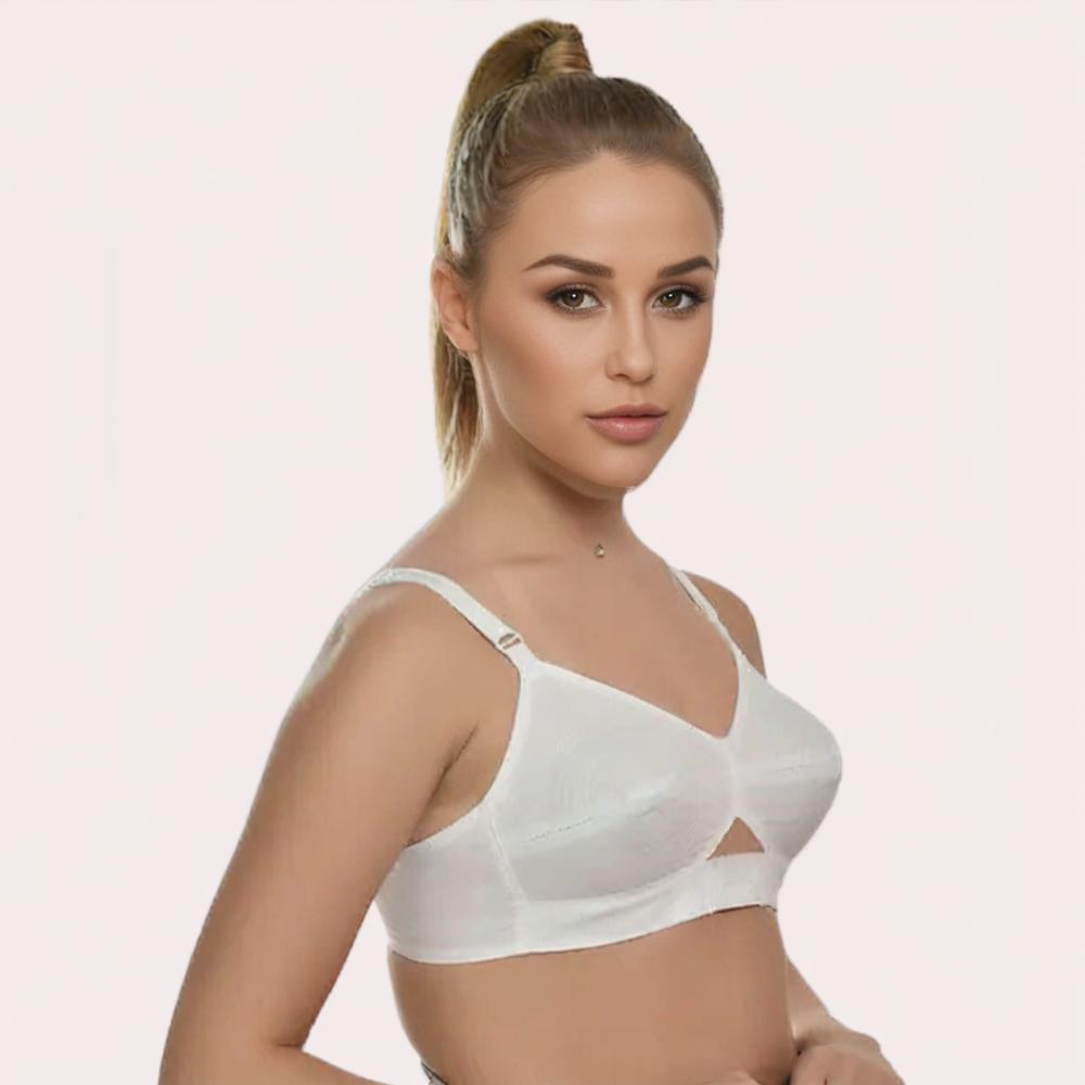 Woman wearing a white bra side view
