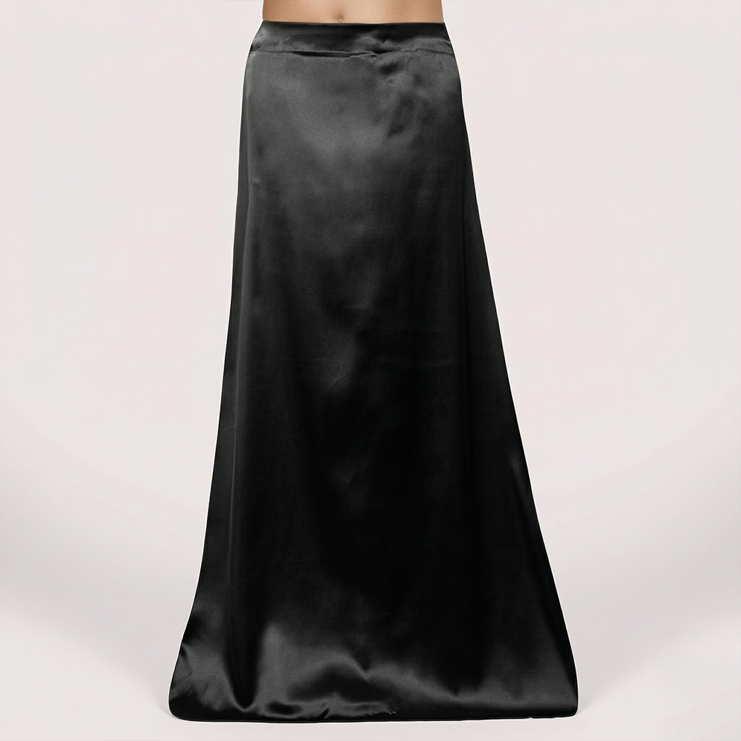 Black satin skirt on a white background