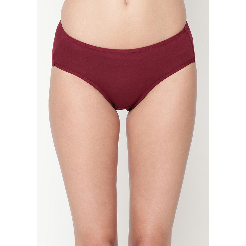 Maroon underwear worn by a person on a light gray background