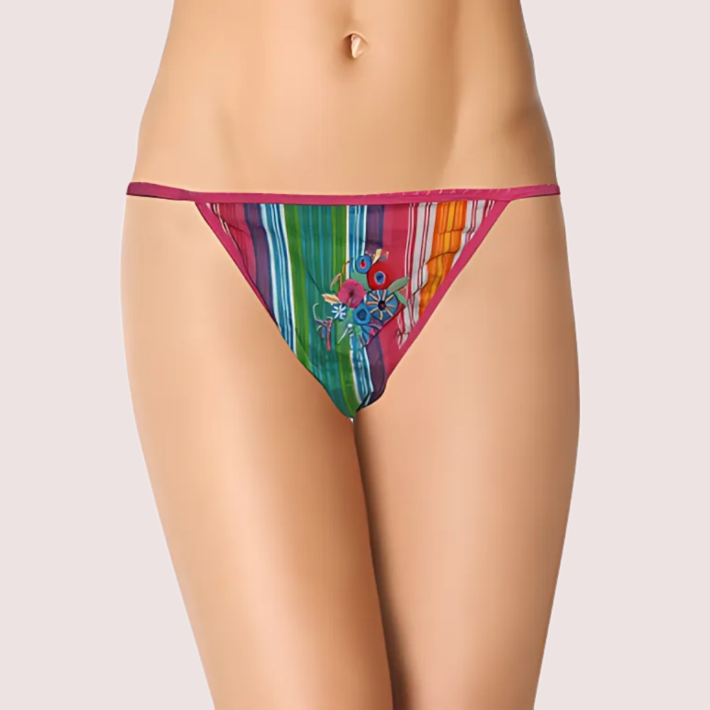 Colorful striped bikini bottom with floral design on a plain background