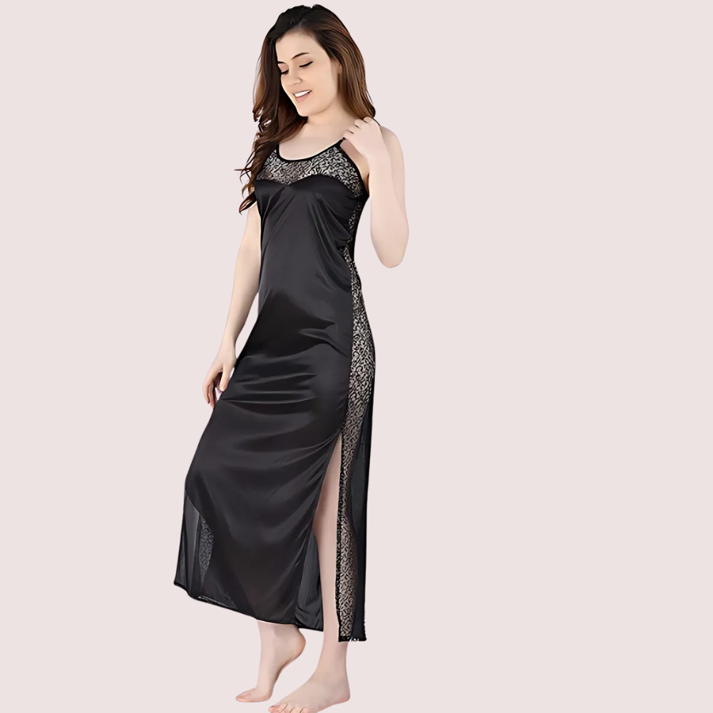 Woman wearing a black satin nightgown with lace details on a beige background