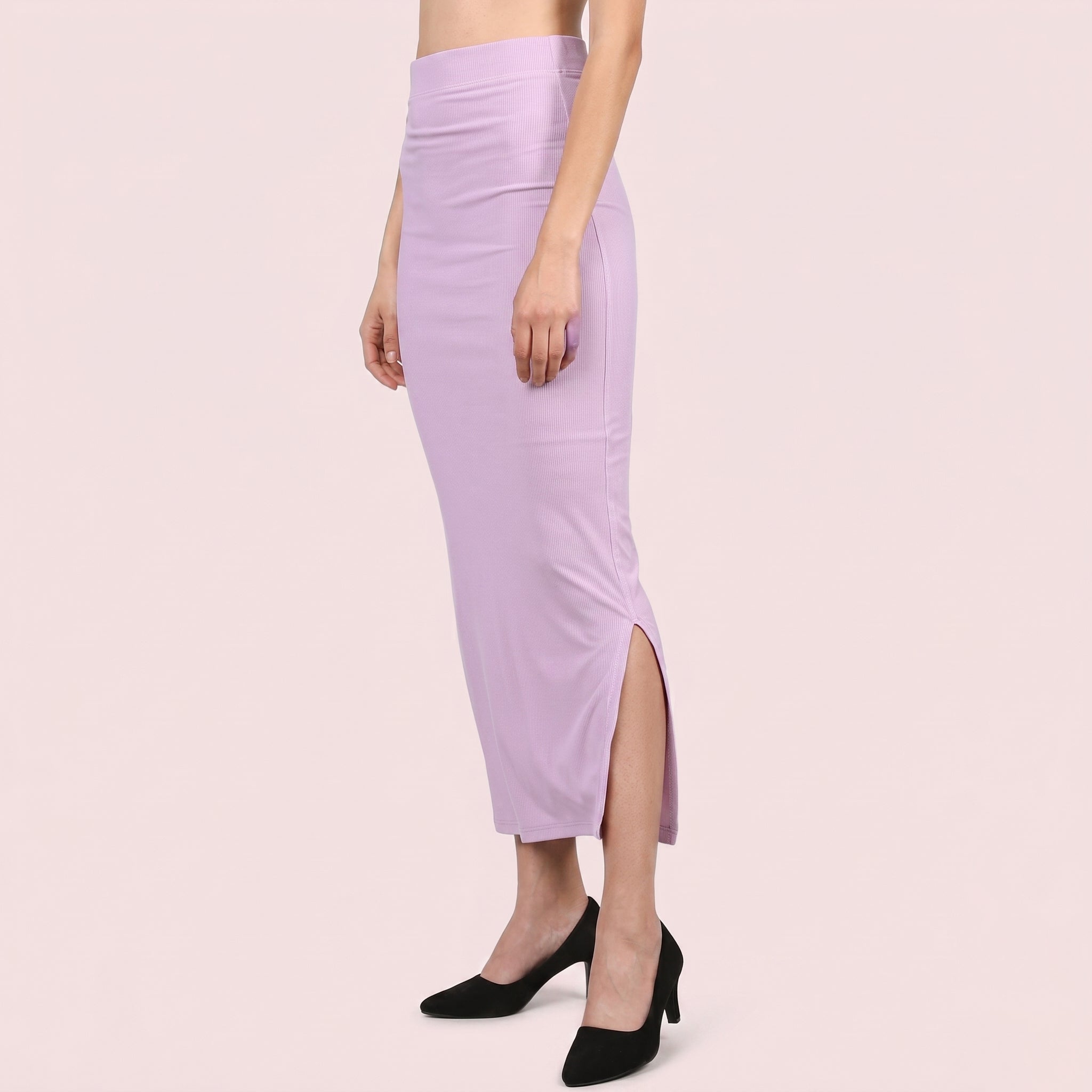 Lavender pencil skirt worn by a person on a light pink background