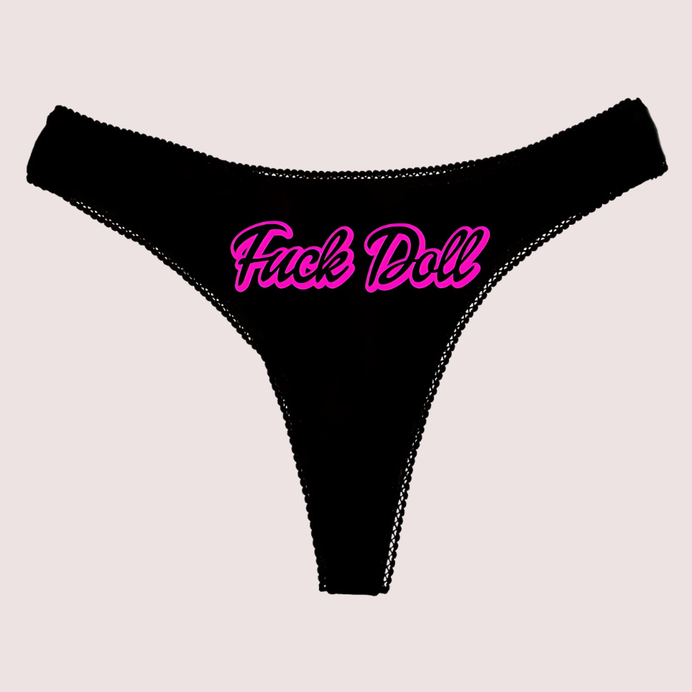 Black thong with pink text on a light gray background