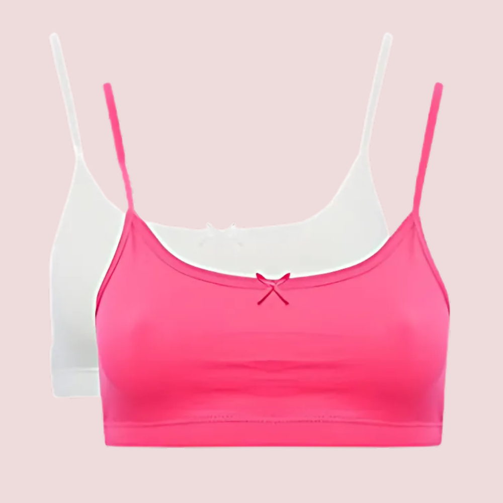 Pink and white bralette on a pink background