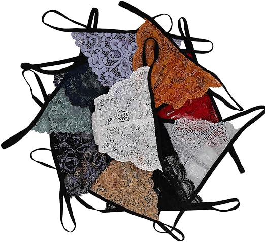 Set of lace lingerie in various colors on a white background