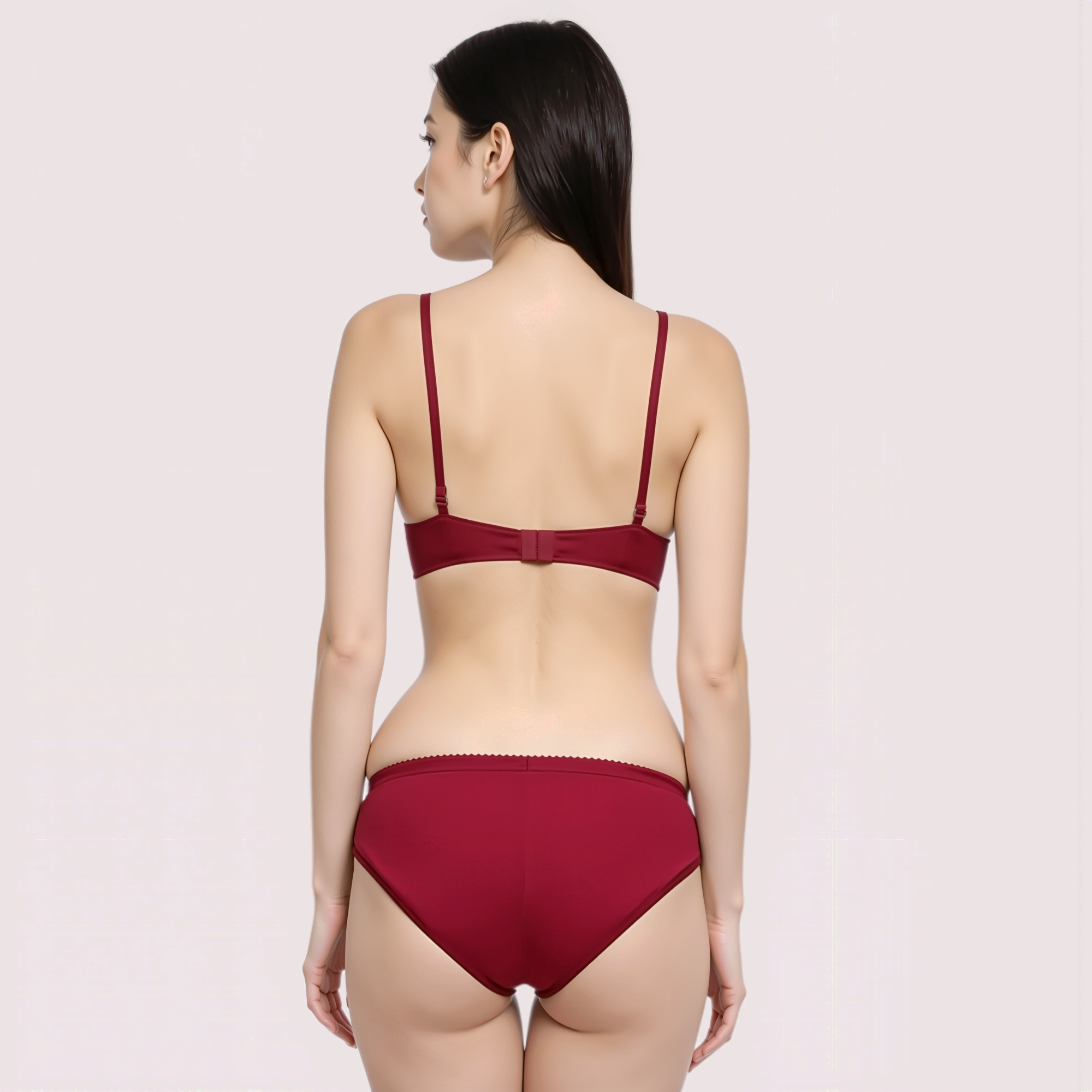 Red bikini set on a model against a plain background