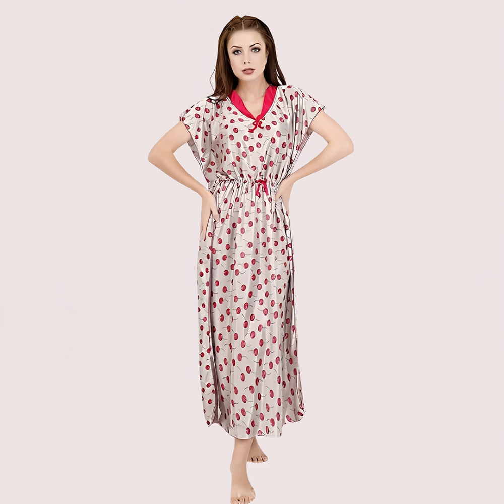 Woman wearing a polka dot dress with a red collar on a beige background