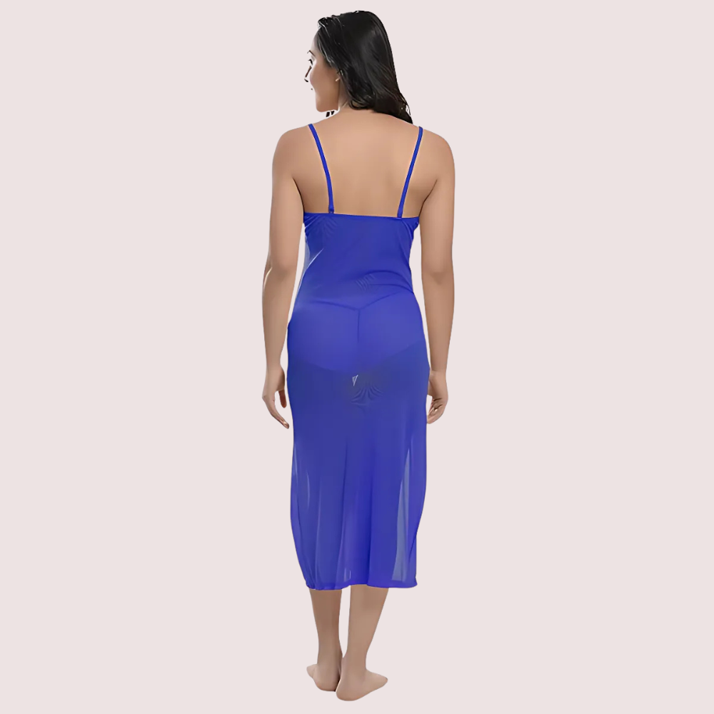 Woman wearing a blue nightgown on a beige background