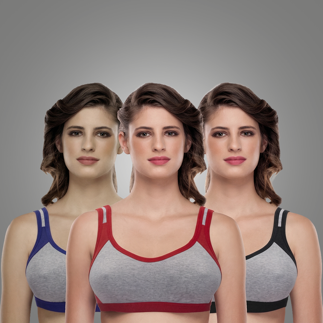 Three women wearing different styles of sports bras against a gray background
