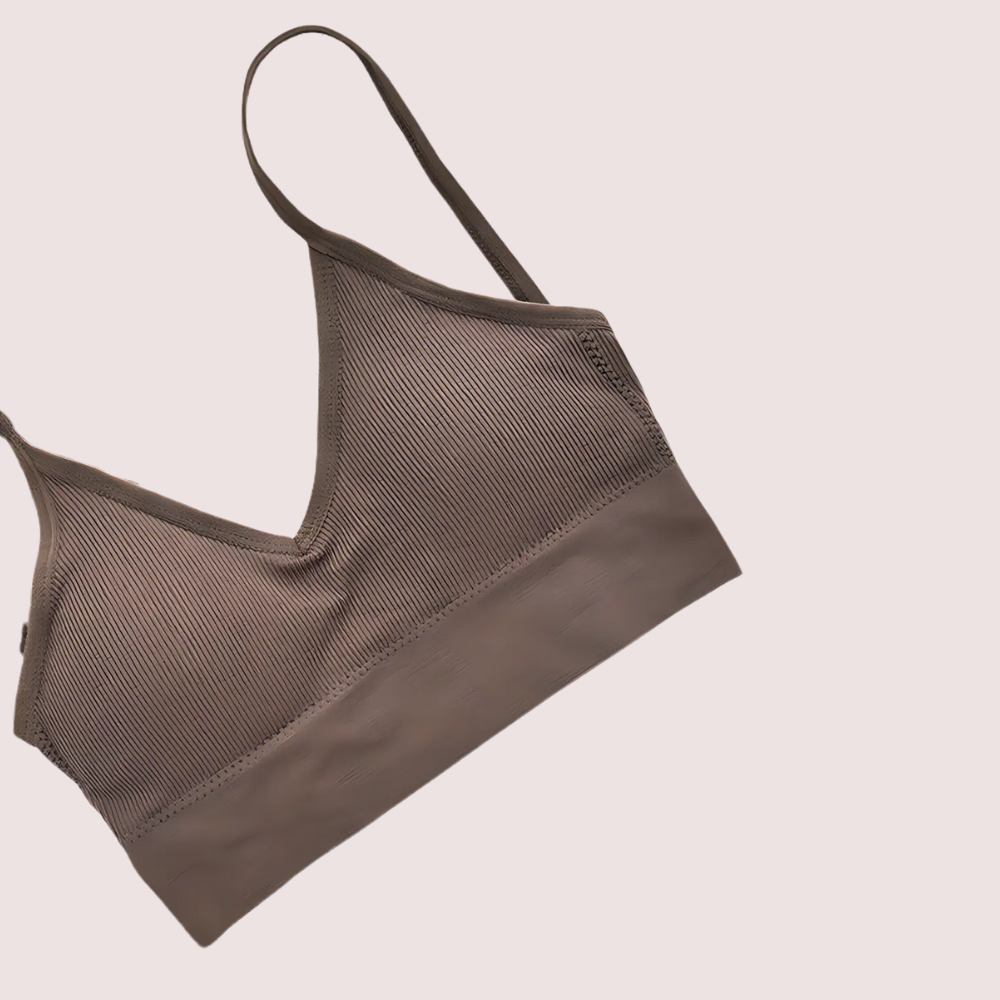 Brown sports bra on a light gray background