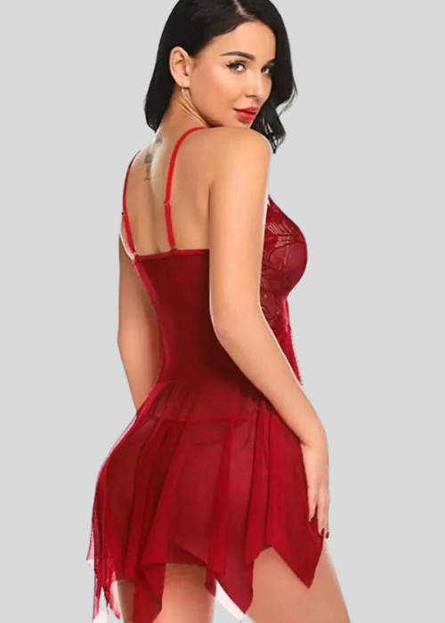 Woman wearing a red lace lingerie set on a gray background