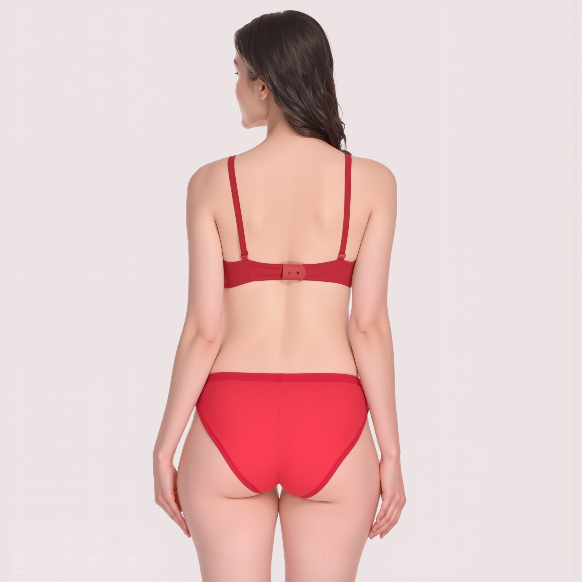 Red bikini set on a plain background