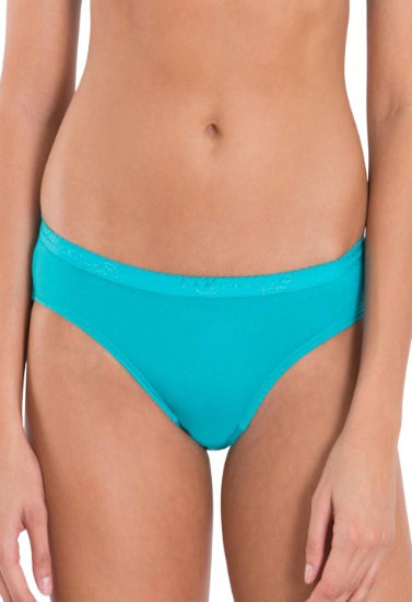 Turquoise bikini bottom worn by a person on a white background