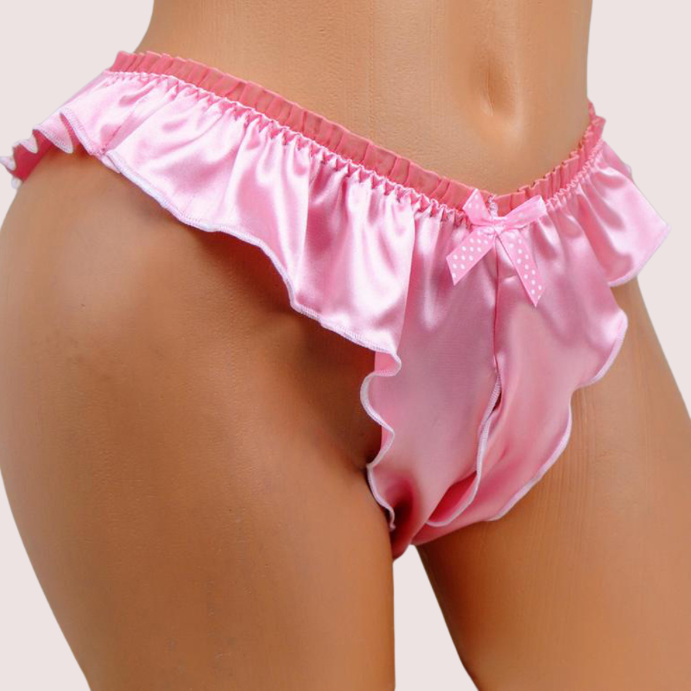 Pink satin babydoll with ruffles on a neutral background