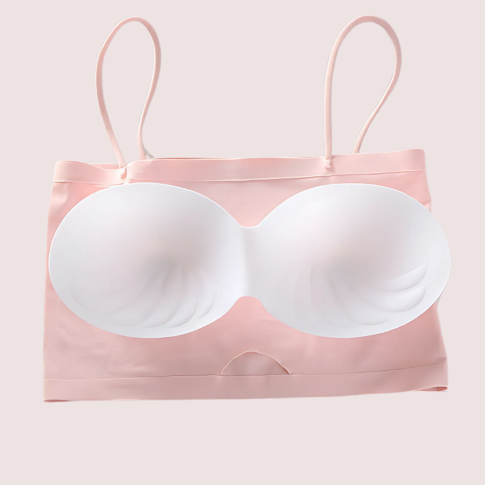 White bra with pink straps on a light pink background