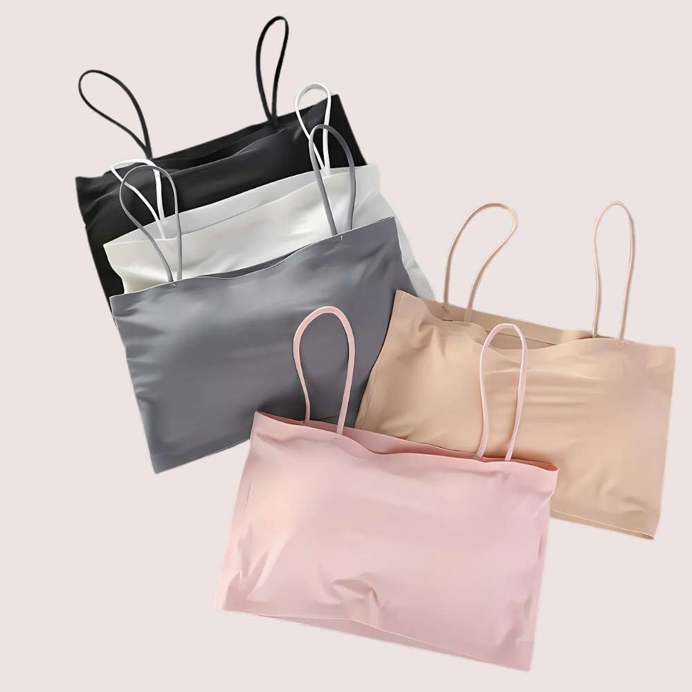 Set of five satin camisoles in various colors on a light background