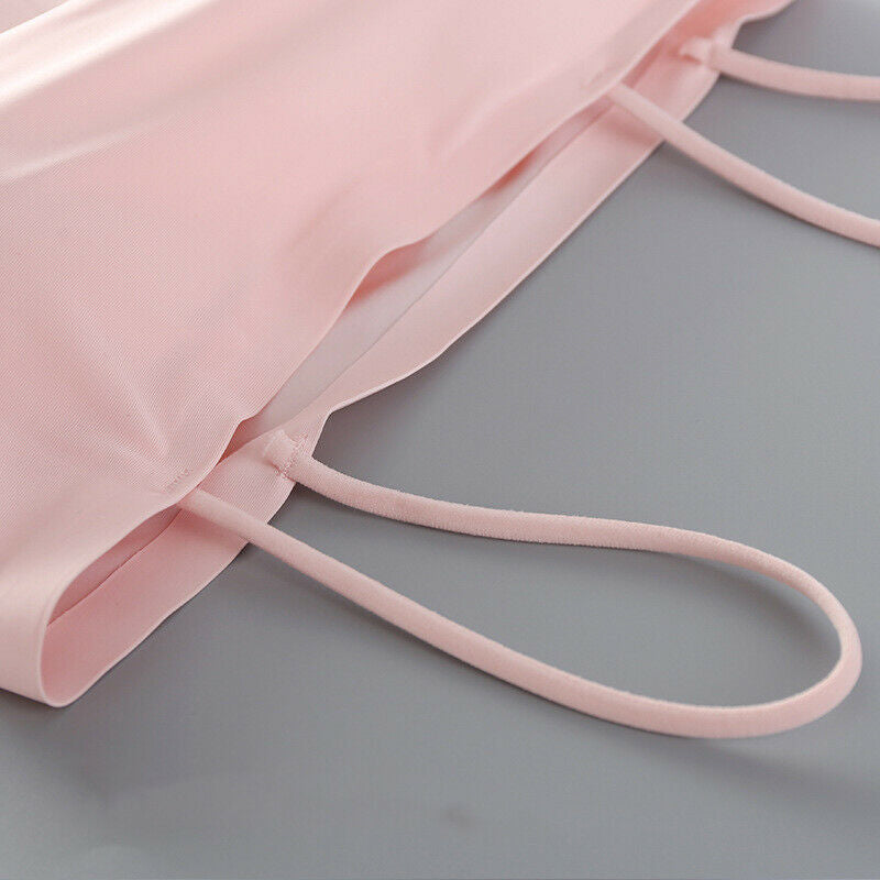Close-up of a pink face mask on a gray surface