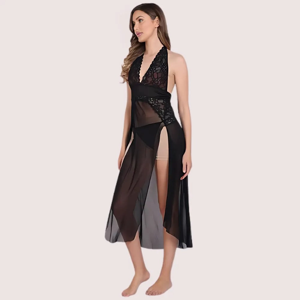 Woman wearing a black lace dress on a beige background
