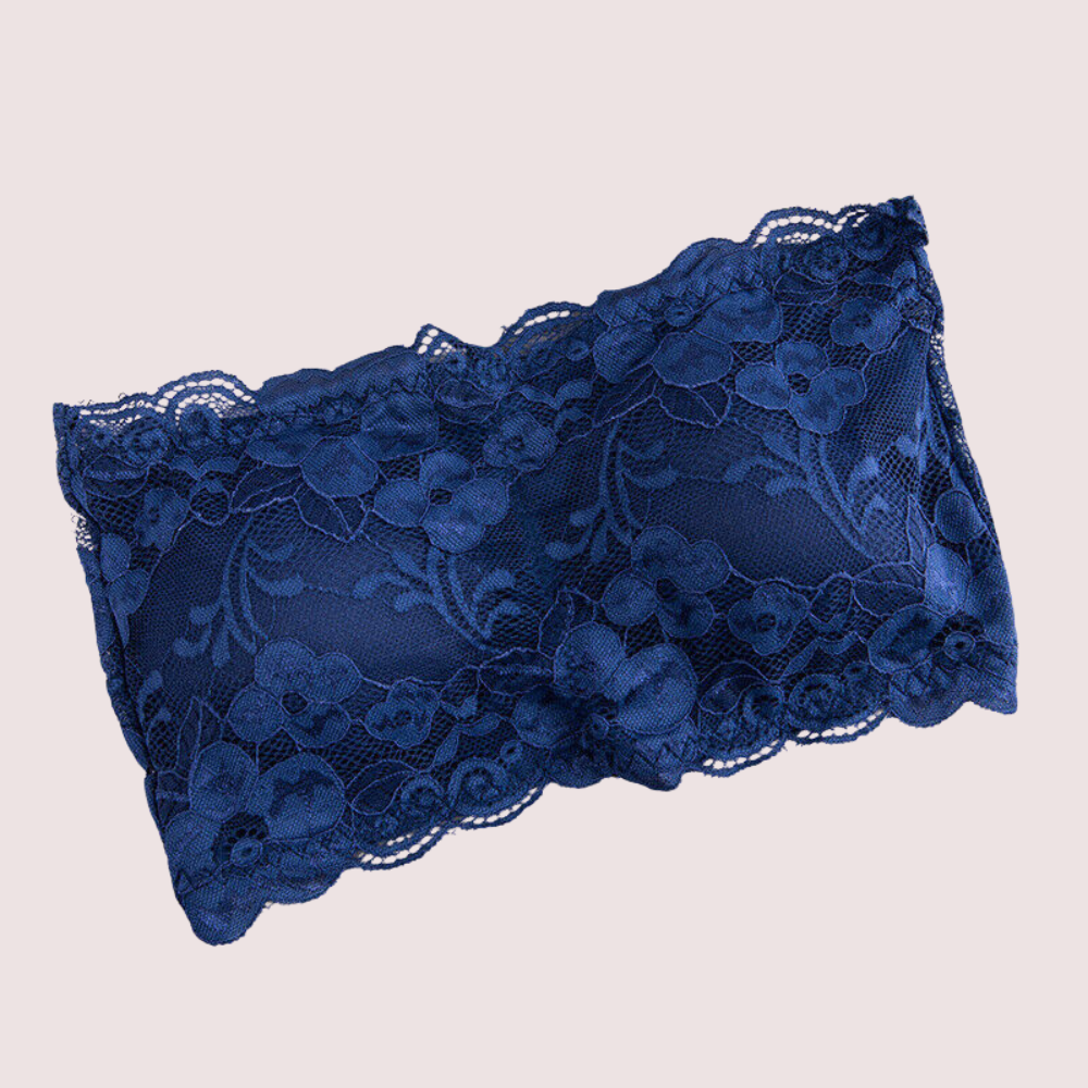 Blue lace bralette on a beige background